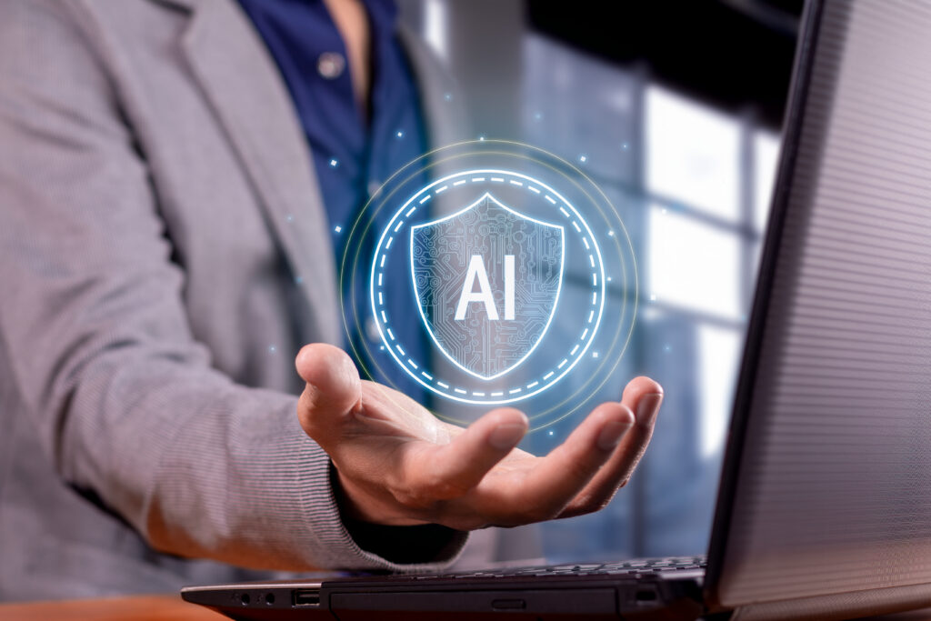 Man Holding a Digital AI Shield over Laptop