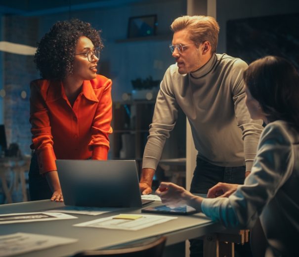 Small,Creative,Team,Meeting,In,The,Evening,In,Office.,Young